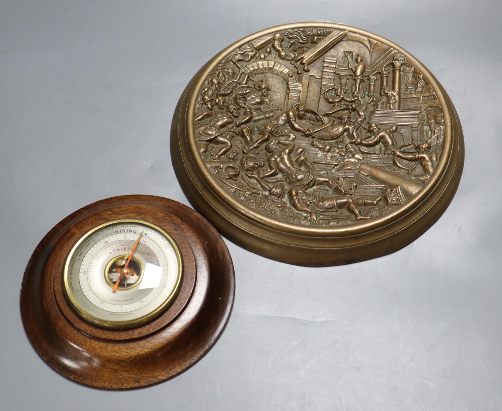 A 19th century bronze circular wall plaque cast with a classical scene and a Short & Mason Stormoguide wall barometer
